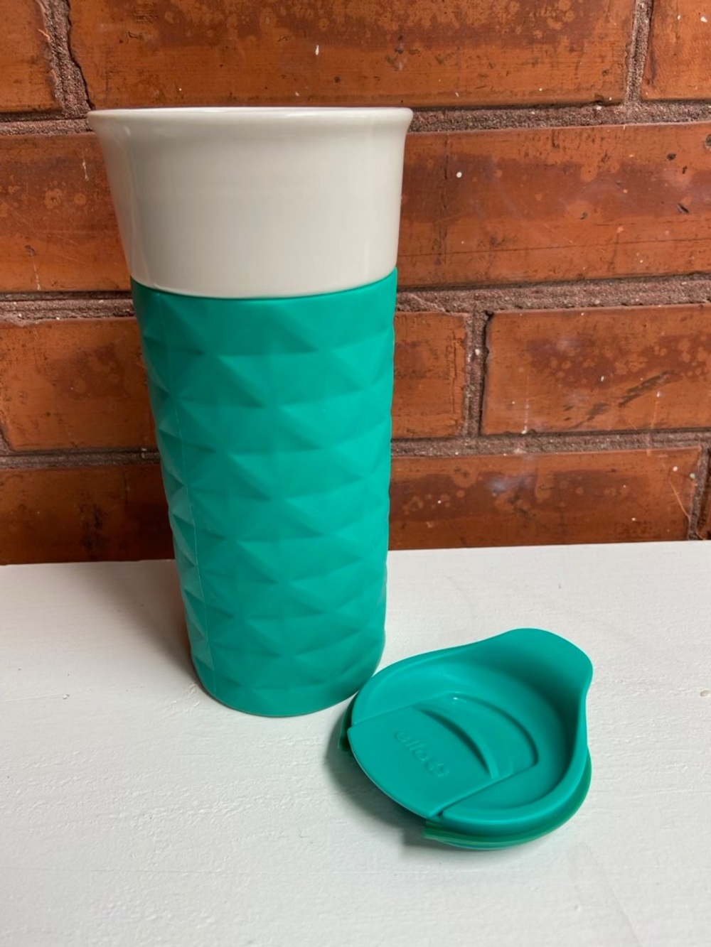 Ello Textured Ceramic Travel Mug with Teal Silicone Sleeve and Lid 16 oz